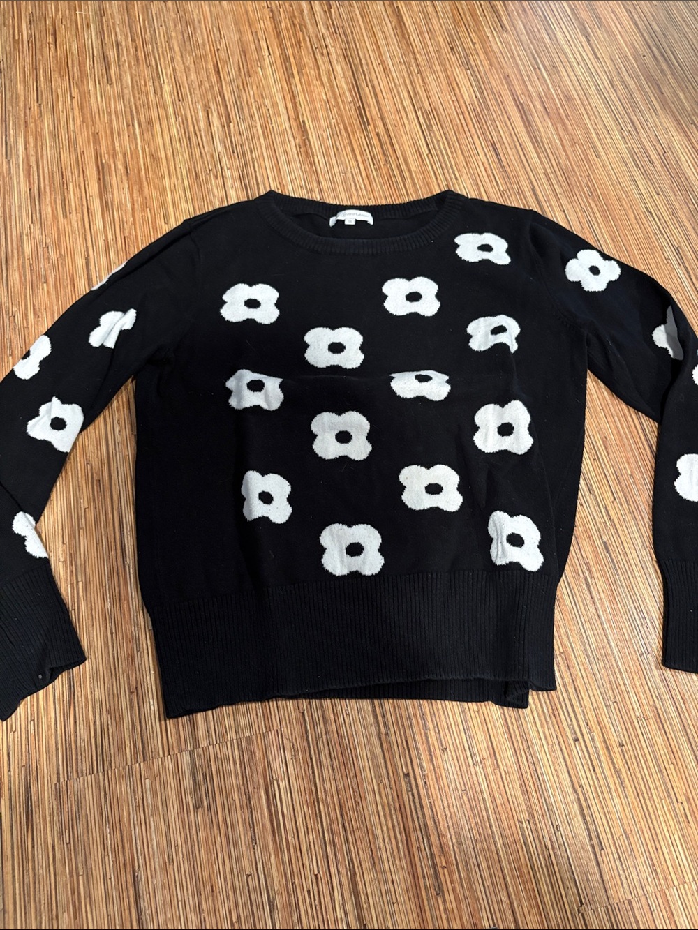 Glamorous Black Sweater with White Floral Motif